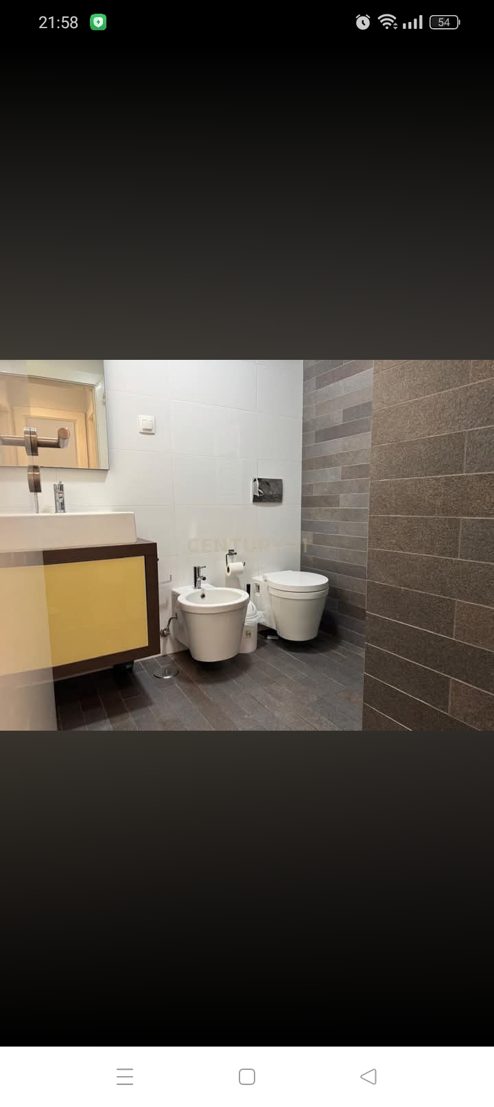 Casa de banho bege remodelada com bidé e sanita Lisboa
